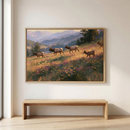 a large painting of a group of elk in a grassy field, with mountains in the background.