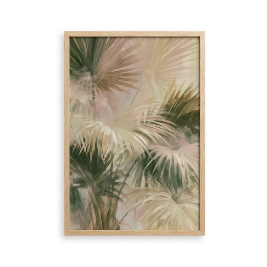 The image is a framed print featuring a close-up view of palm leaves in various shades of green and beige.