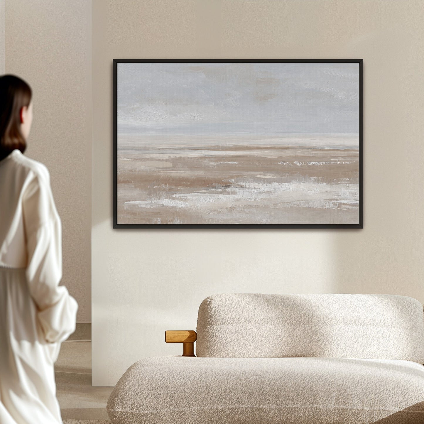 Minimalist barren landscape canvas print in soft taupe, cream, and sand tones, framed in black for modern interiors