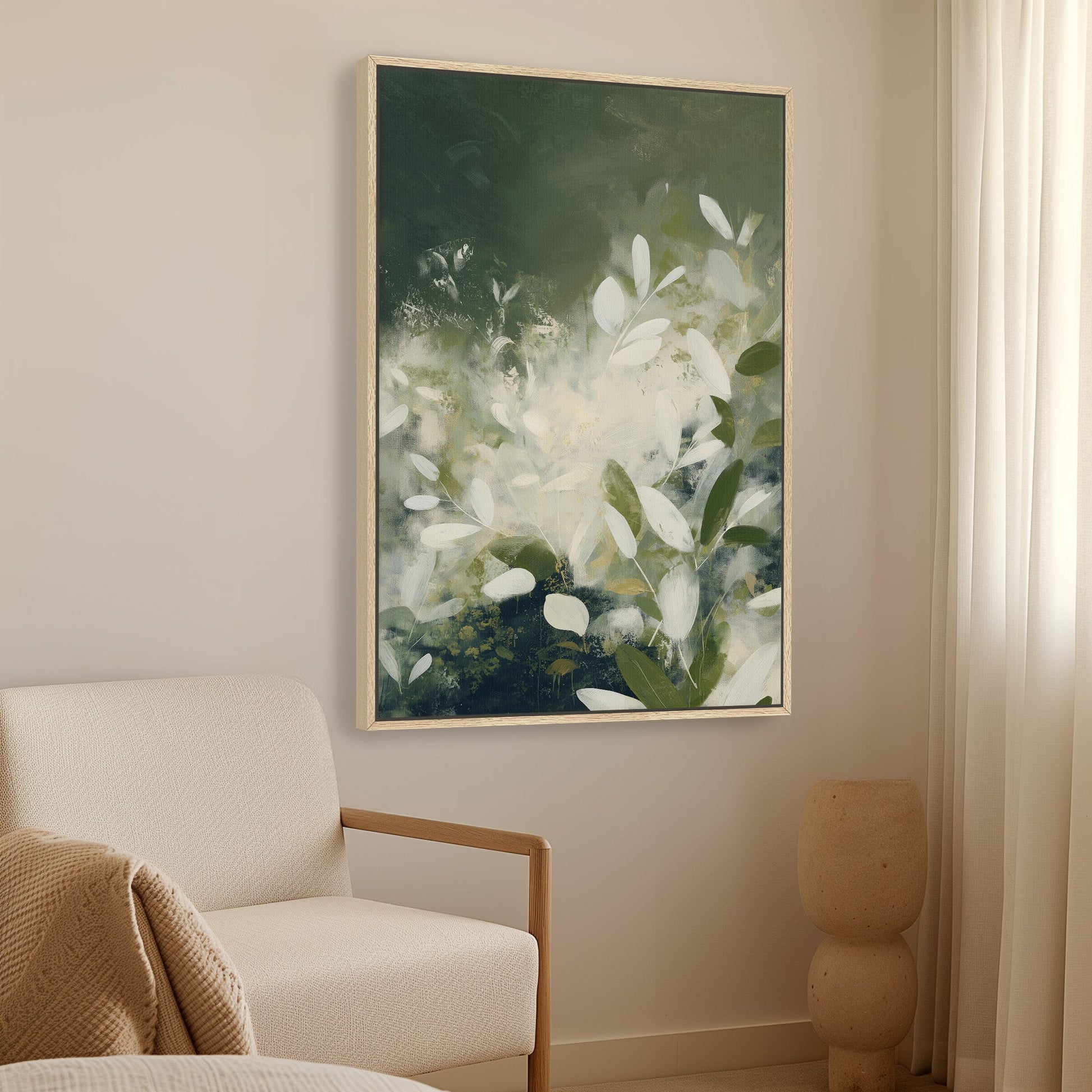 Verdure canvas wall art featuring soft ivory leaves and deep green botanical abstraction in a natural wood frame hanging in a minimalist living room