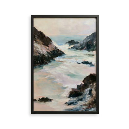 The image is a framed painting depicting a serene coastal landscape with rocky cliffs, crashing waves, and a hazy sky.
