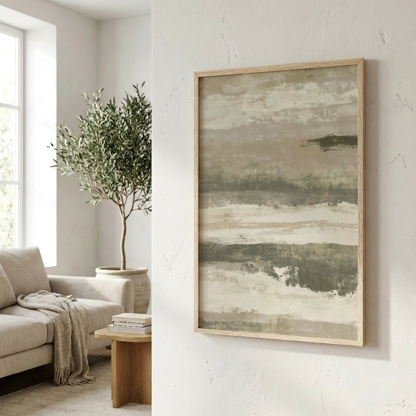 a cozy living room with a large abstract painting hanging on the wall, a comfortable couch, and a potted plant.