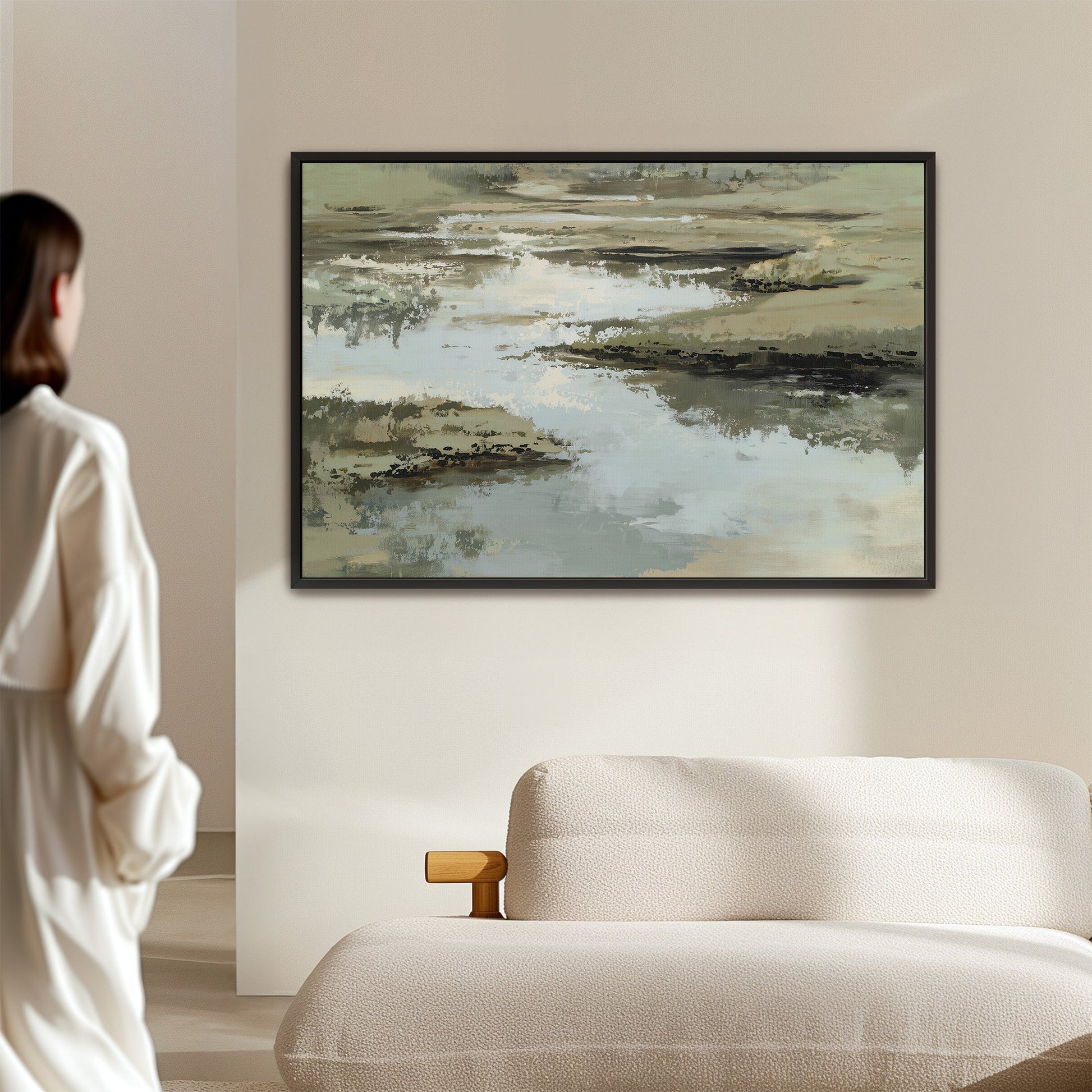 Reed Canvas Print abstract landscape in sage, sand, and ivory tones with black frame in modern living room