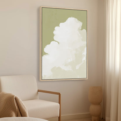 Rise canvas wall art depicting a white cloud ascending against muted sage background in a modern living room.