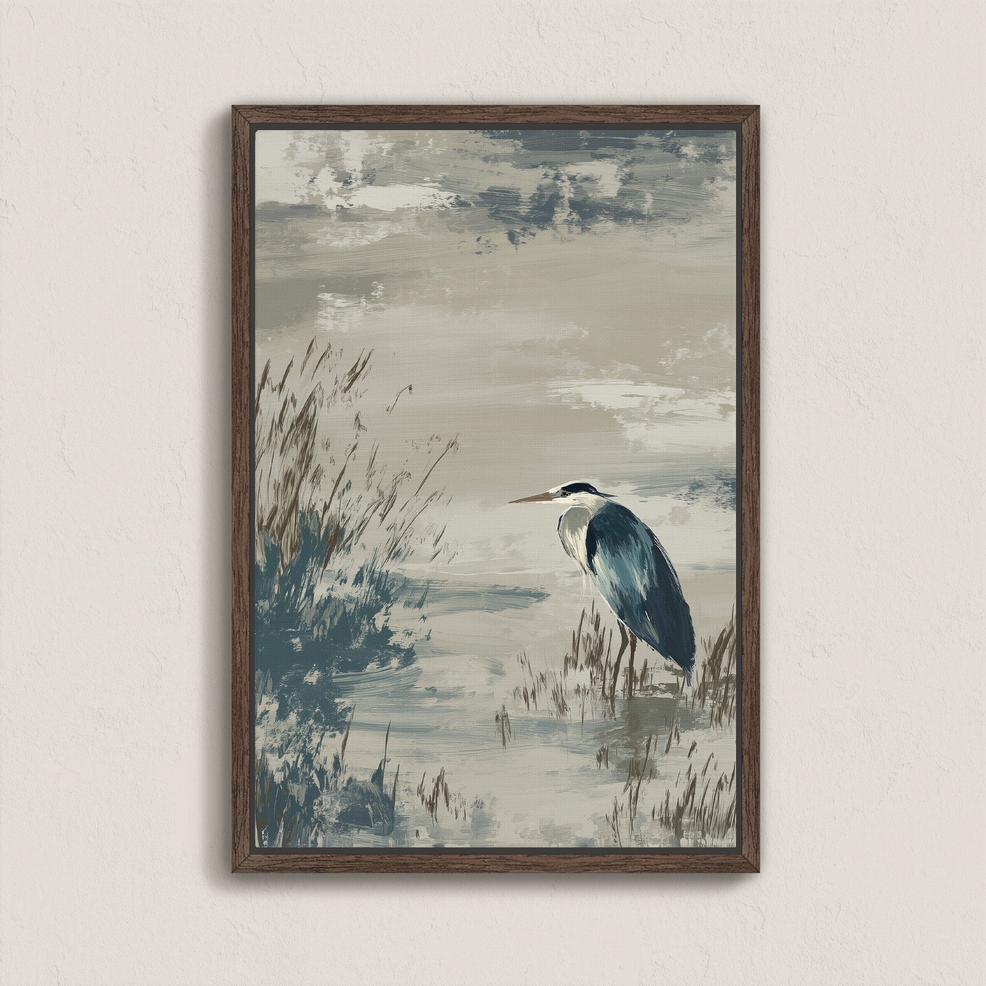 Mire canvas print of a solitary heron by water with reeds in muted natural tones, framed in dark wood