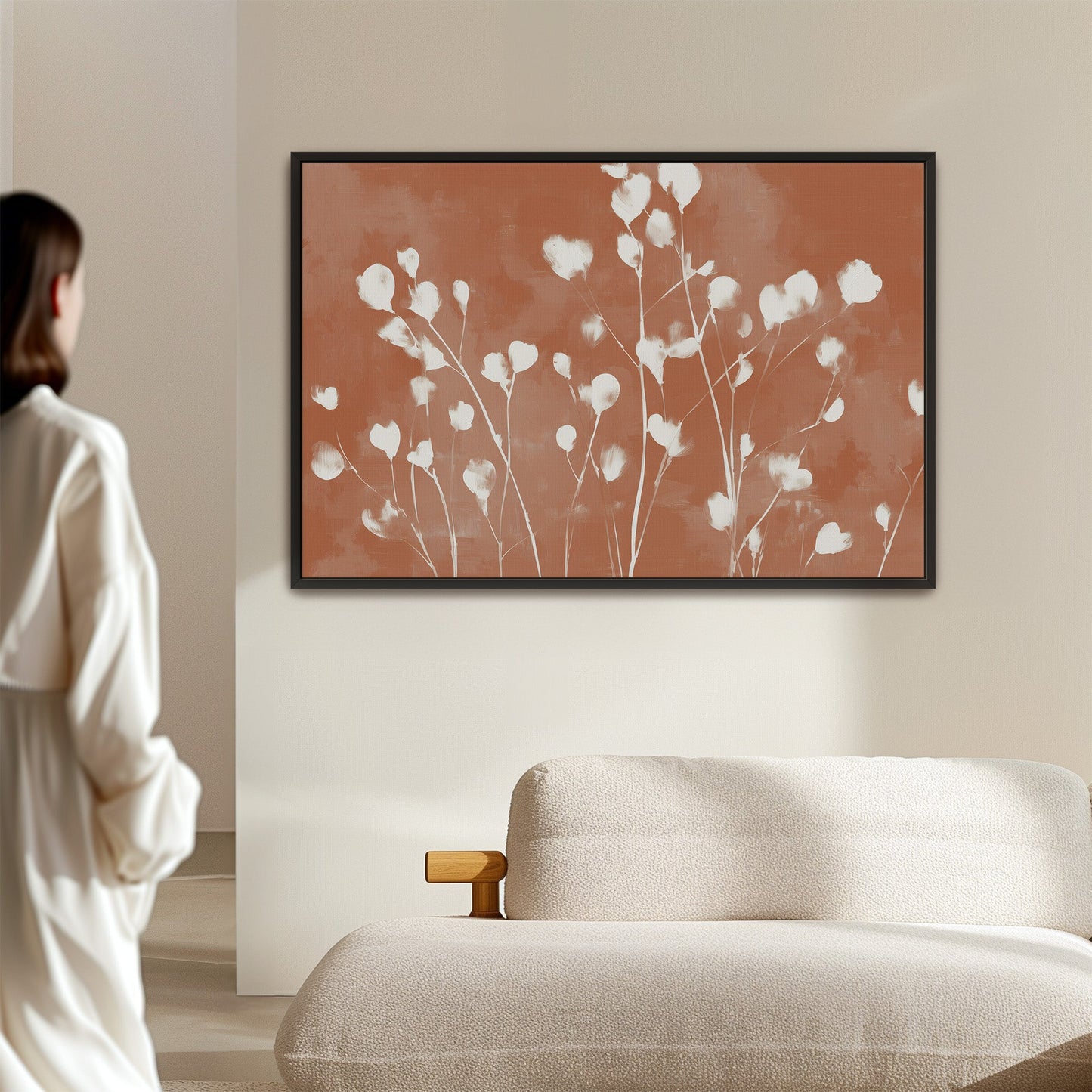 Ember Canvas Print with white petals on terracotta background in modern living room