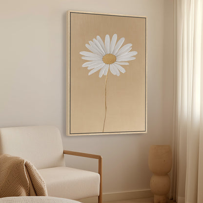 'Bloom' canvas print featuring a white daisy on a golden-beige background in a minimalist room setting