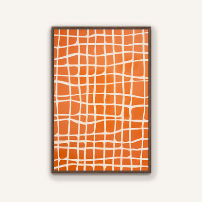 a square-shaped frame with a grid-like pattern of orange and white squares.