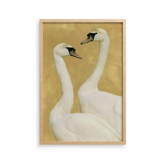 Two elegant white swans with long necks and black beaks are depicted in a framed artwork against a golden background.