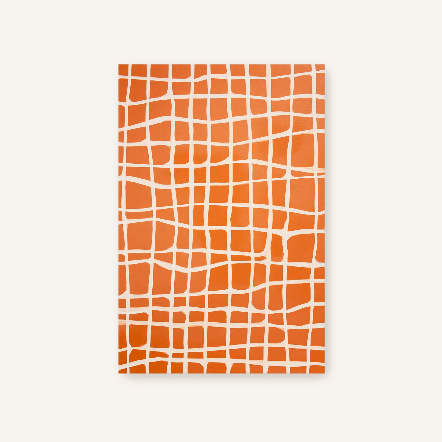 a square with a grid-like pattern of orange and white squares.