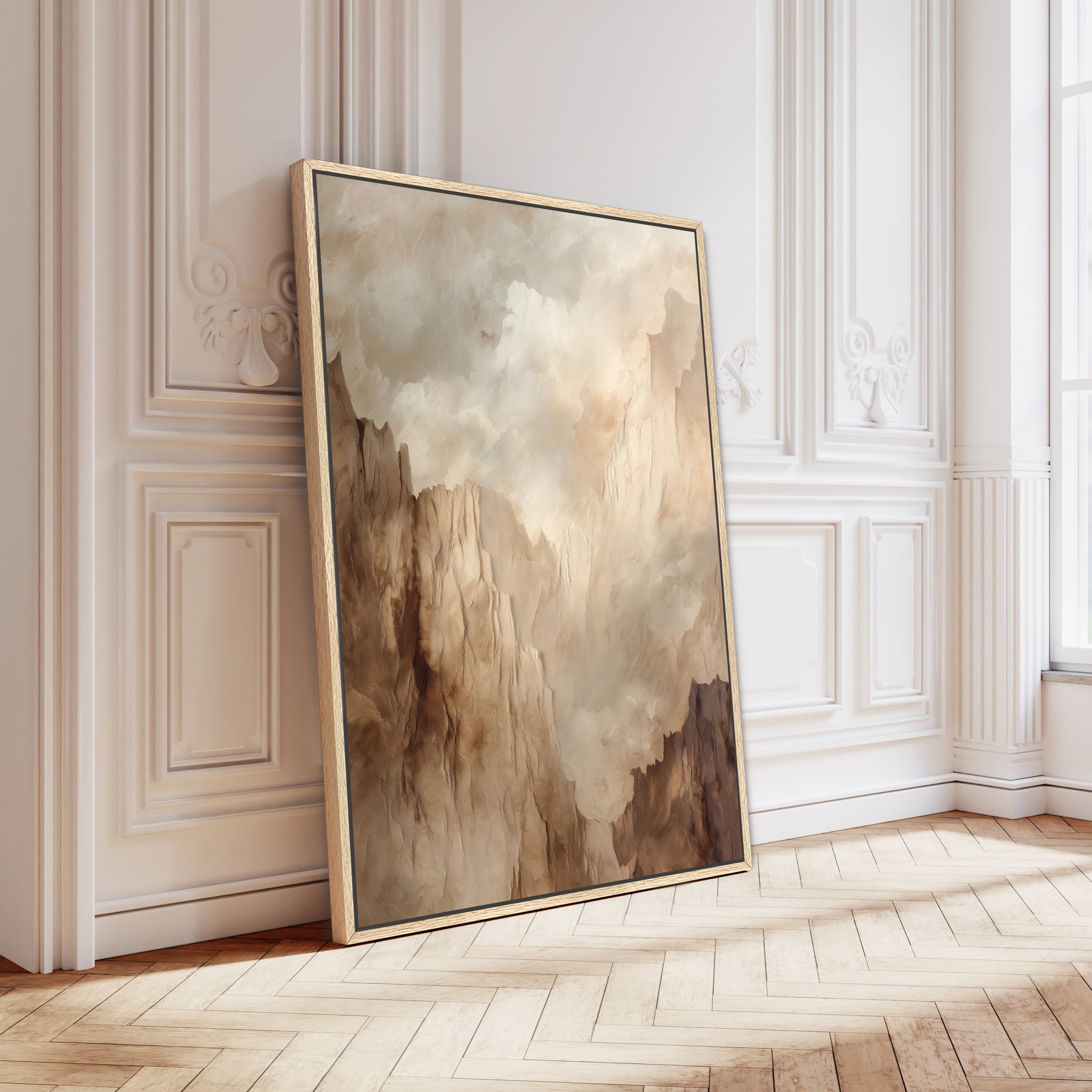 a large, framed painting of a landscape with a cloudy sky, leaning against a white wall in a room with a wooden floor.