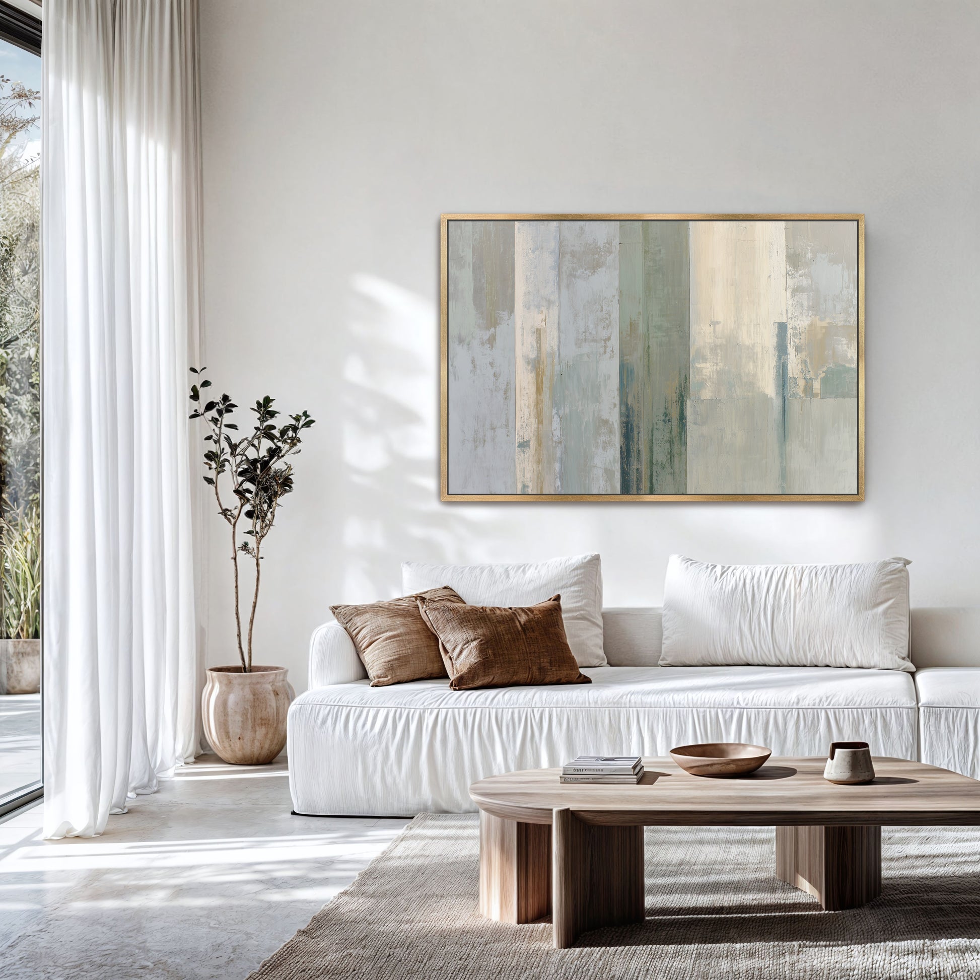 a modern living room with a white sofa, a wooden coffee table, and a large abstract painting on the wall.