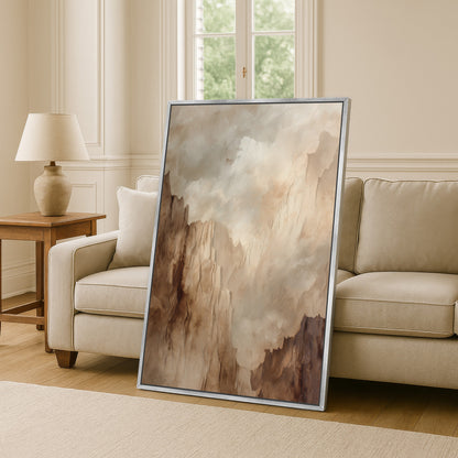 a large, framed painting of a landscape with a cloudy sky, placed on a wooden floor in a living room setting.