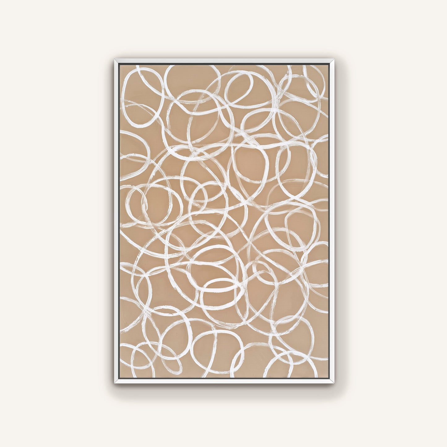 a square frame with a repeating pattern of white circles on a beige background.