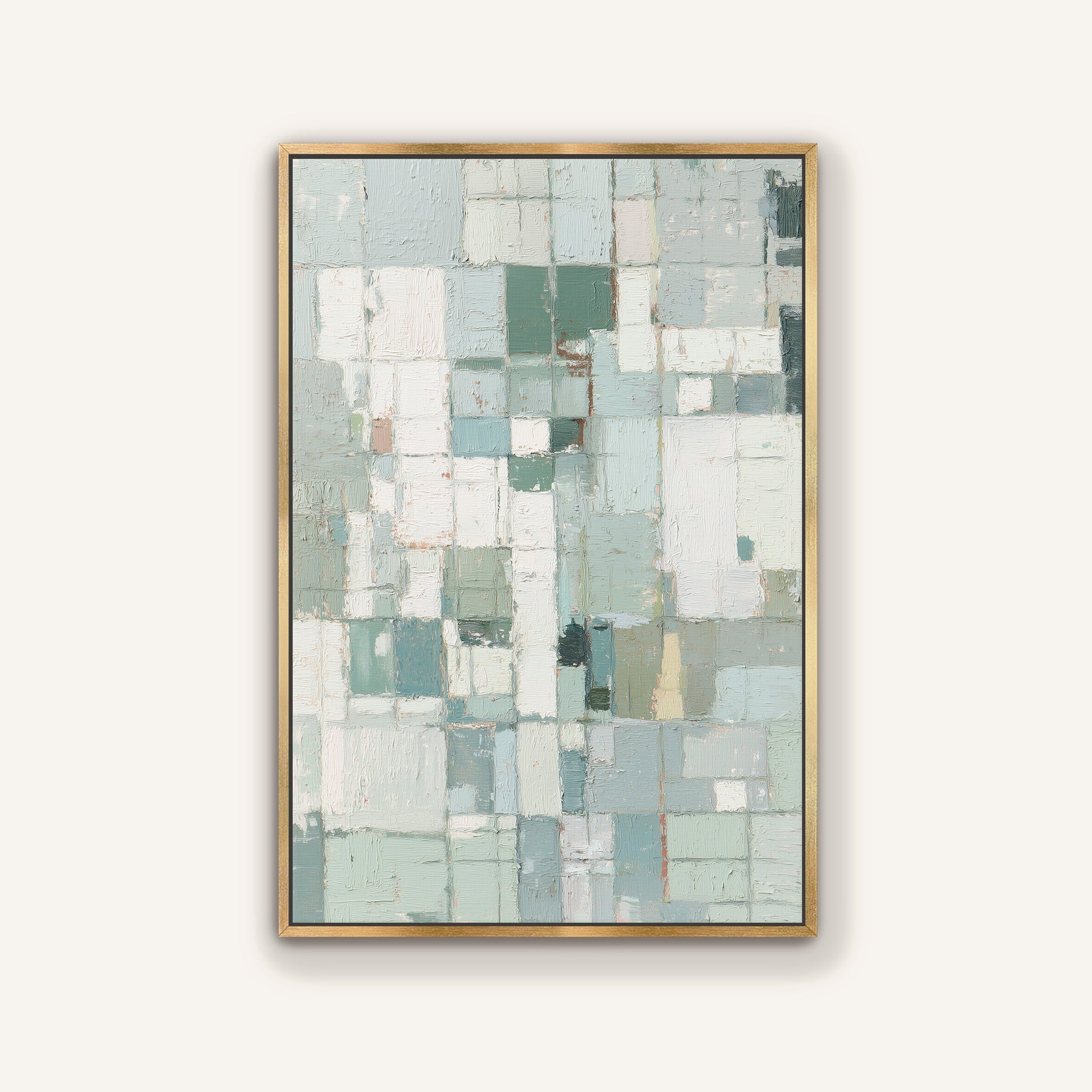 Abstract geometric wall art in gold frame displayed in airy living space.