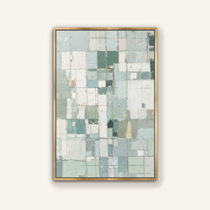 Abstract geometric wall art in gold frame displayed in airy living space.