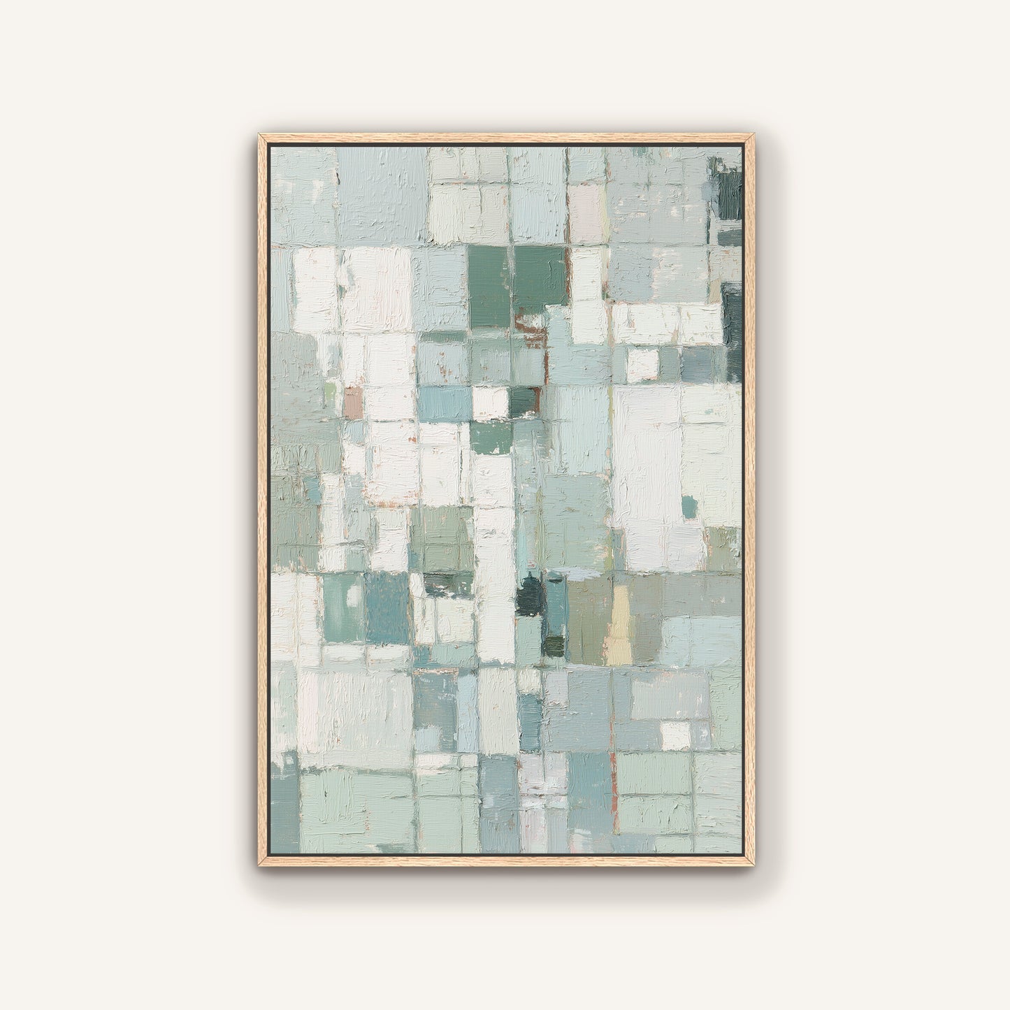 Framed abstract art with natural oak frame featuring a geometric pattern on a white wall