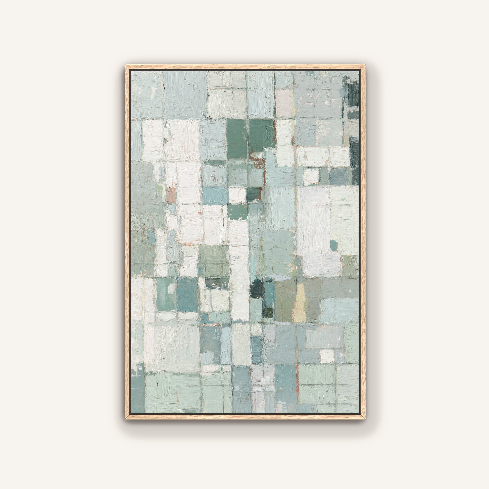 Framed abstract art with natural oak frame featuring a geometric pattern on a white wall
