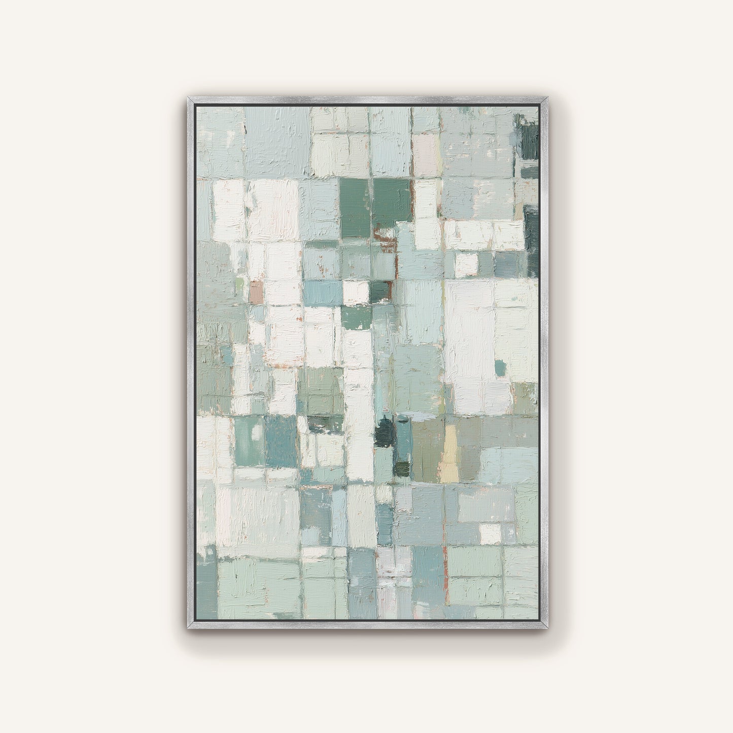 Abstract geometric canvas framed in silver on a neutral background