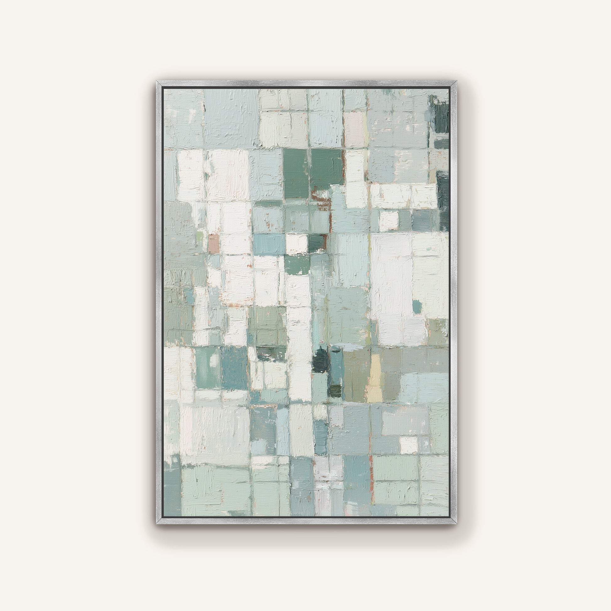 Abstract geometric canvas framed in silver on a neutral background