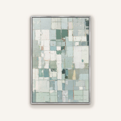 Abstract geometric canvas framed in silver on a neutral background