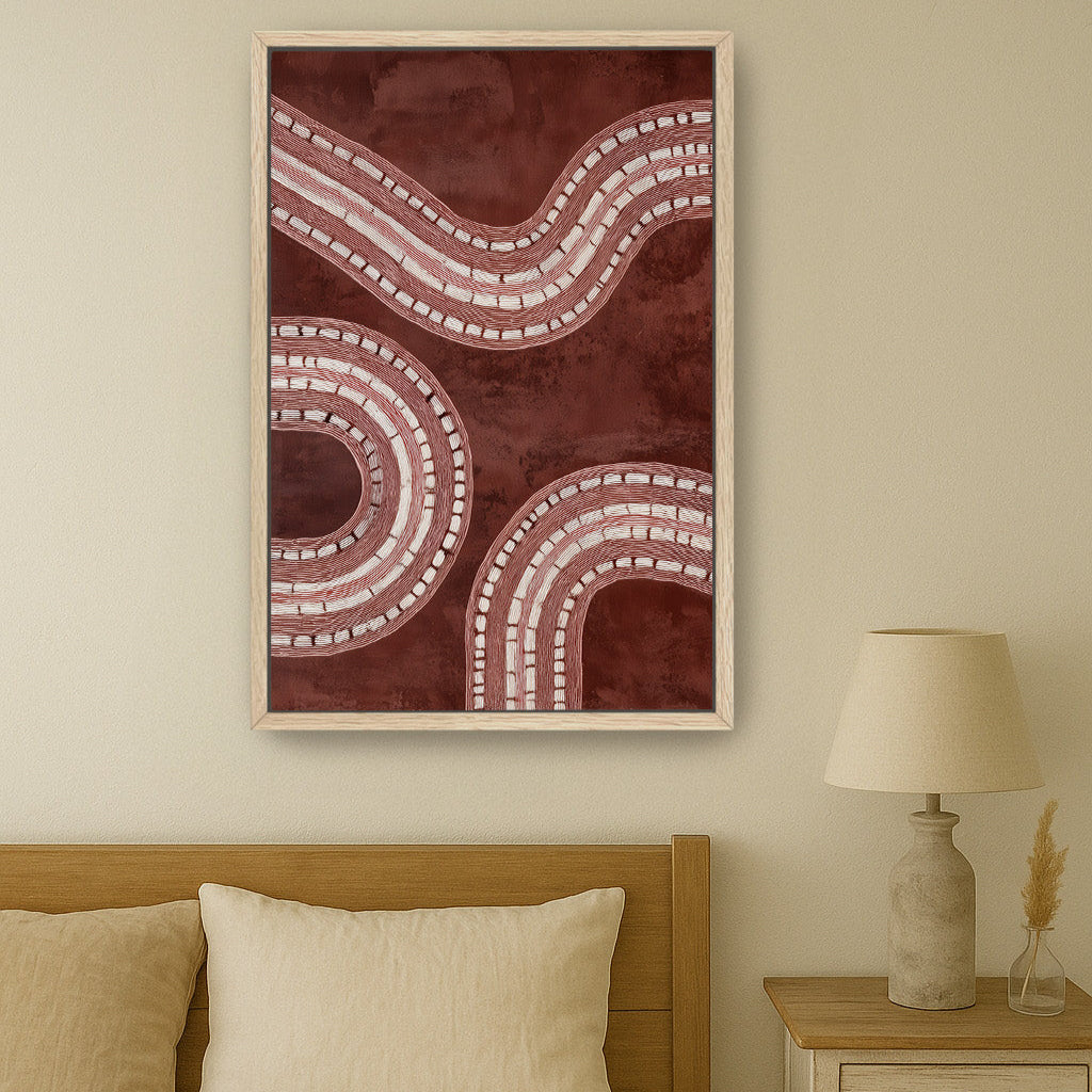 Minimal abstract framed canvas print hanging above neutral bed.
