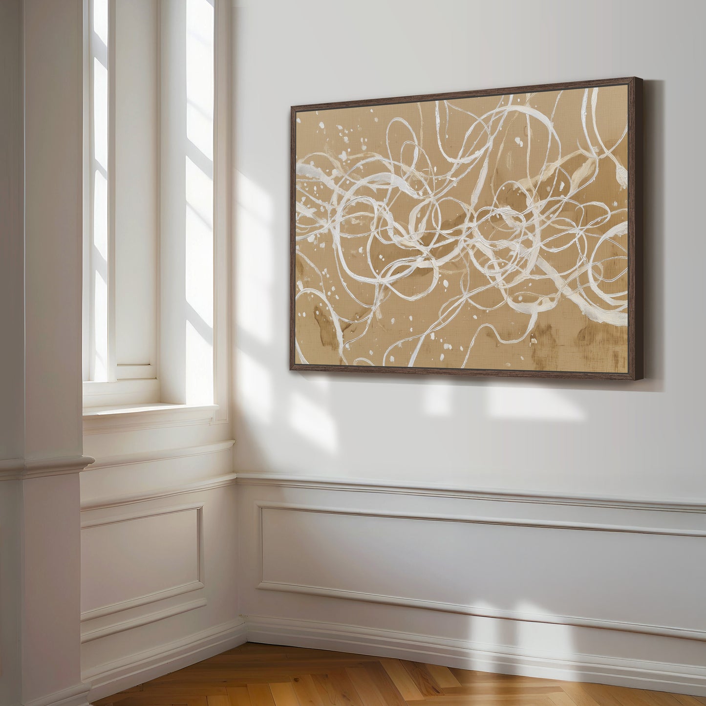Abstract beige and ivory canvas with espresso frame displayed in corner light