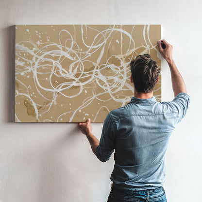 Man hanging abstract beige and ivory linework unframed canvas