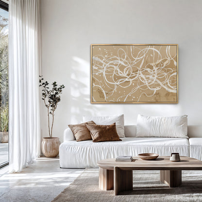 Large neutral abstract linework artwork styled above white sofa