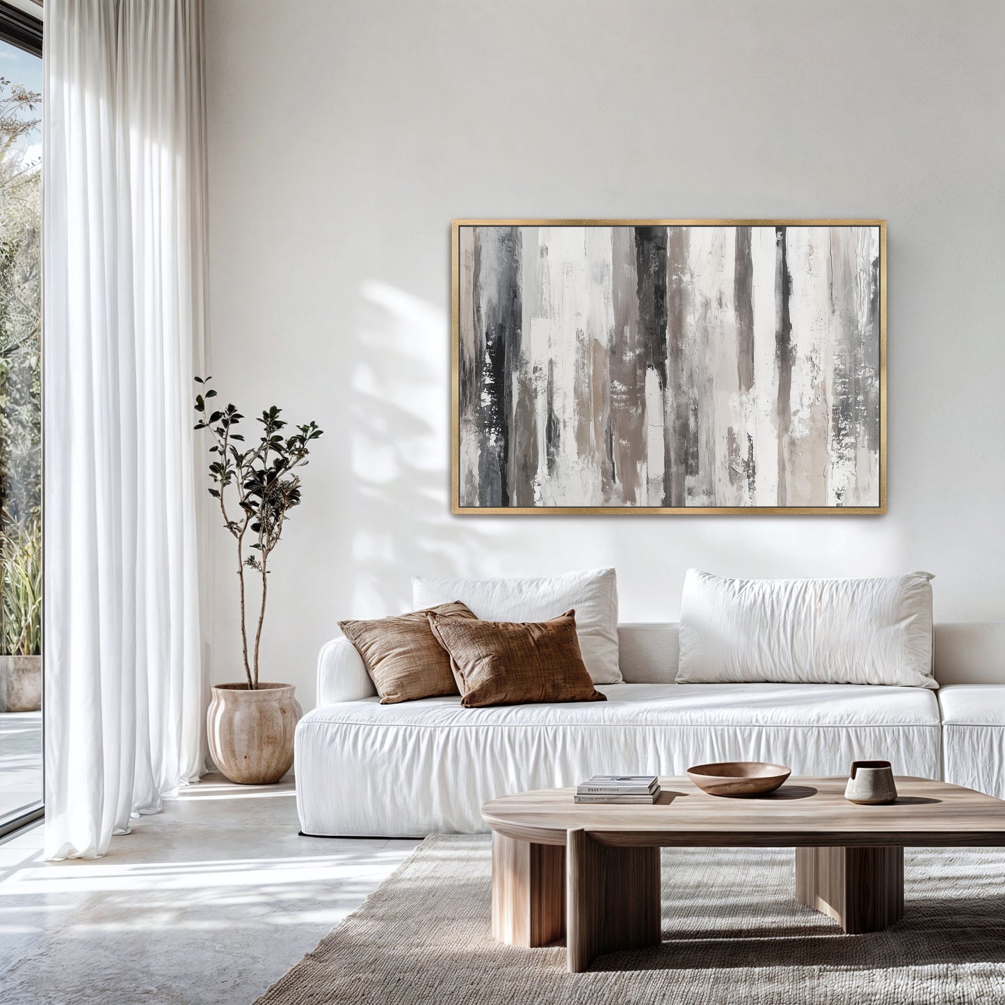 a modern living room with a white sofa, a wooden coffee table, and a large abstract painting on the wall.
