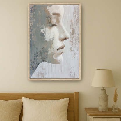 a bedroom setting with a large framed portrait of a woman's face hanging on the wall above a bed with a wooden headboard.