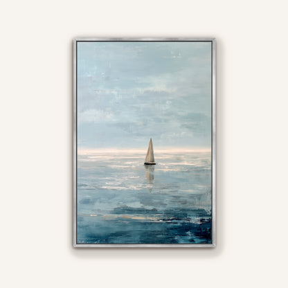 a sailboat on the water, with a cloudy sky in the background.
