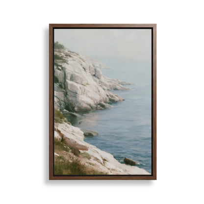 a rocky coastline with a calm, blue ocean in the background.