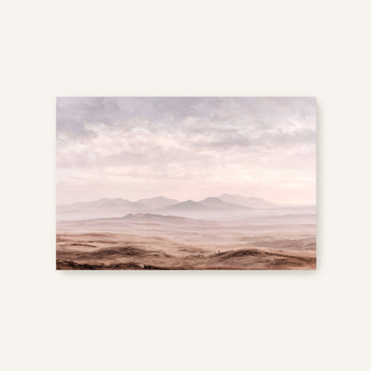 a vast, barren landscape with rolling hills and mountains in the distance, under a cloudy sky.
