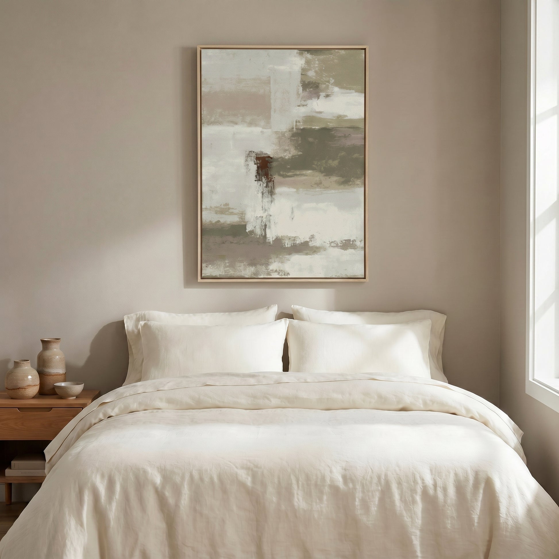 a serene and cozy bedroom scene, featuring a large bed with crisp white linens and pillows, a wooden nightstand with a vase and bowl, and a framed abstract painting hanging above the bed.