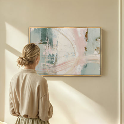 A woman stands in front of a large abstract painting, gazing at it with interest.