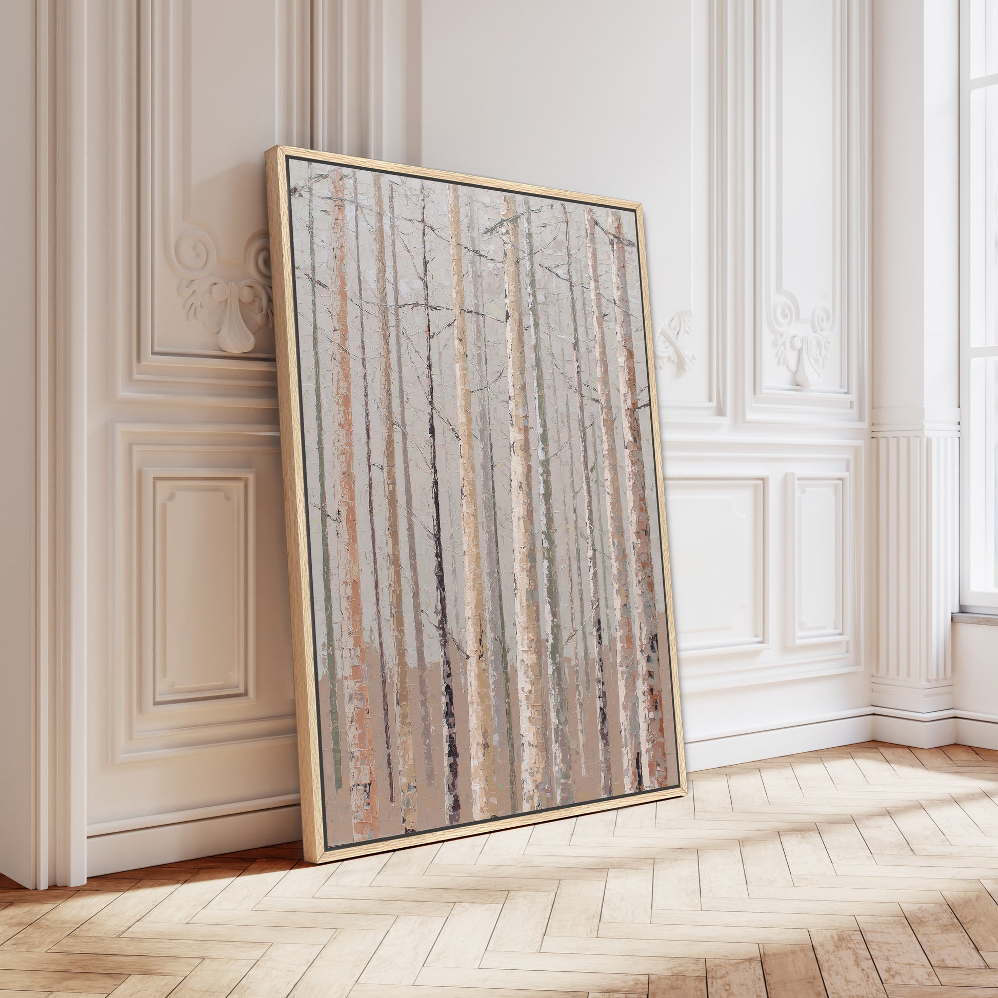 a large, framed painting of a forest scene with tall trees and a wooden floor.