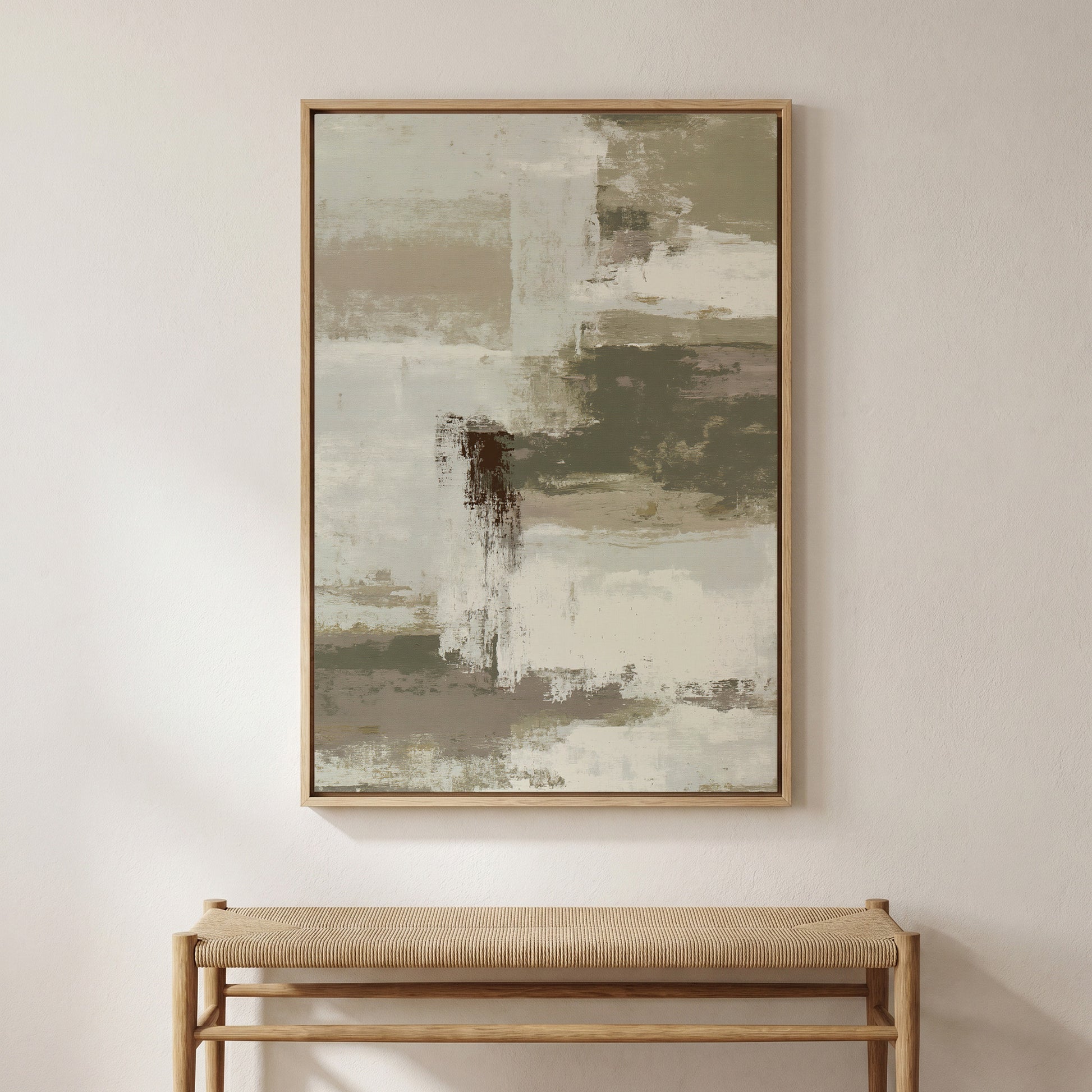 a large abstract painting hanging on a wall above a wooden bench.