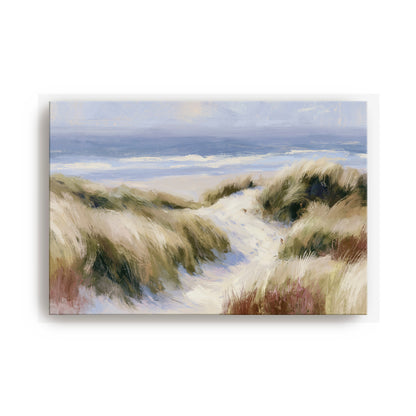 a serene landscape with a sandy beach, grassy dunes, and a body of water in the distance.