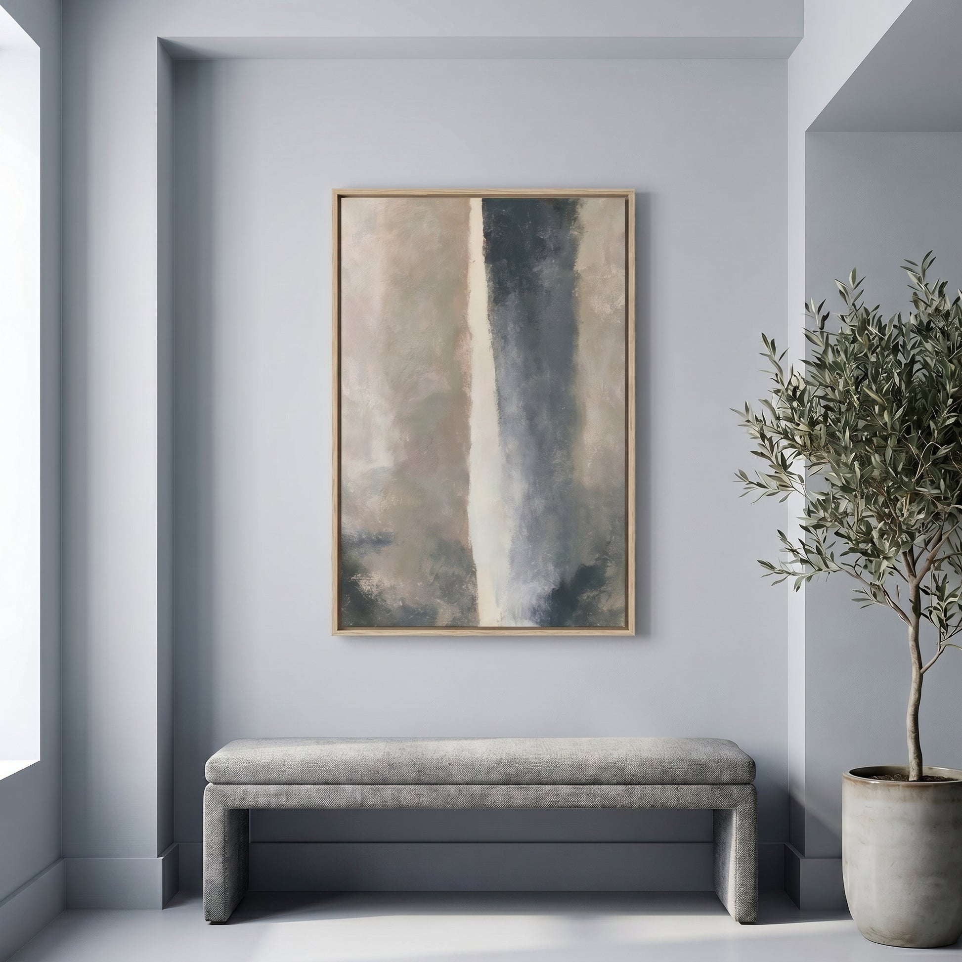 a minimalist interior design with a large abstract painting hanging on a light blue wall above a gray bench. A potted plant is placed to the right of the bench, adding a touch of greenery to the space.
