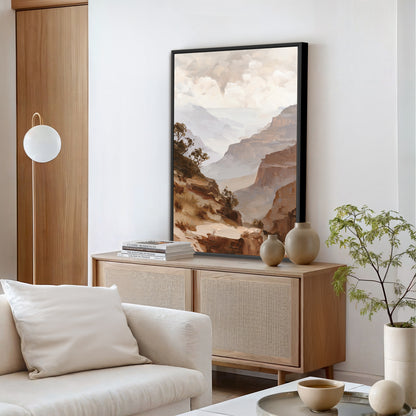 a serene living room with a large framed landscape painting hanging on the wall, a white sofa, a wooden cabinet, and a potted plant.
