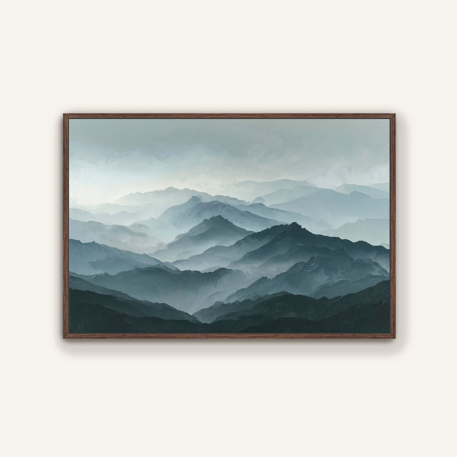 a breathtaking view of a mountainous landscape, with a hazy, misty atmosphere that creates a sense of depth and distance. The mountains appear to be covered in a light gray color, with darker shades of gray and brown adding texture and contrast to the scene. The image is framed and hung on a wall, showcasing the beauty and serenity of the natural environment.