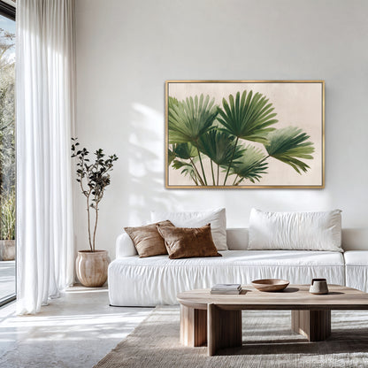 a modern living room with a white sofa, a wooden coffee table, and a large framed print of palm leaves on the wall.