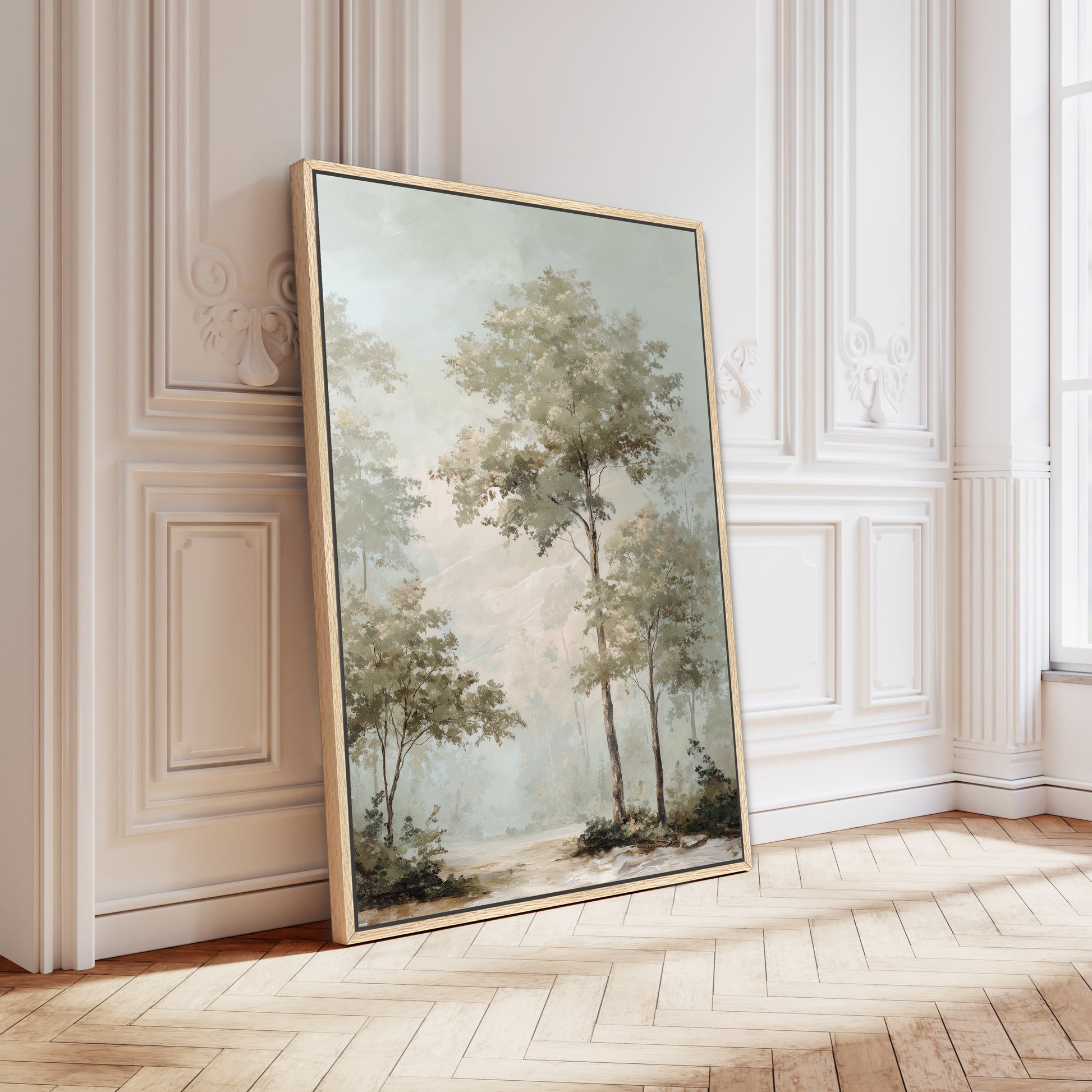 a large painting of a serene landscape with trees and a winding path, displayed on a white wall in a room with a wooden floor.