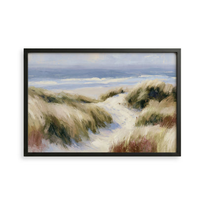 The image is a framed painting depicting a serene beach scene with sand dunes, grass, and the ocean in the background.