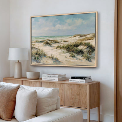 Coastal dunes canvas wall art displayed above a modern wood console in a bright living room
