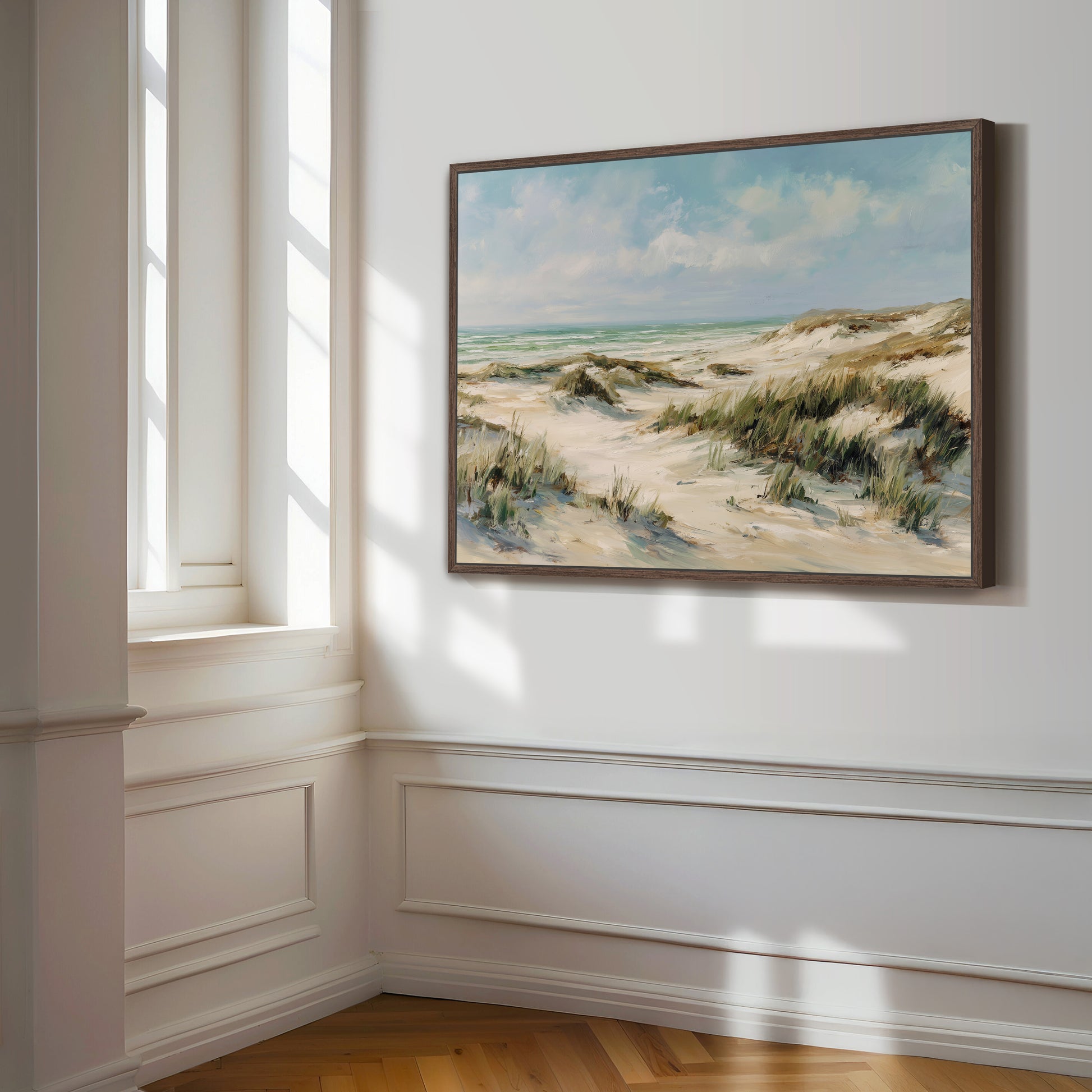 Coastal dunes canvas print in dark wood frame, sunlight streaming through windows