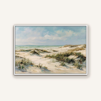 Coastal wall art of sand dunes and sky, framed in white