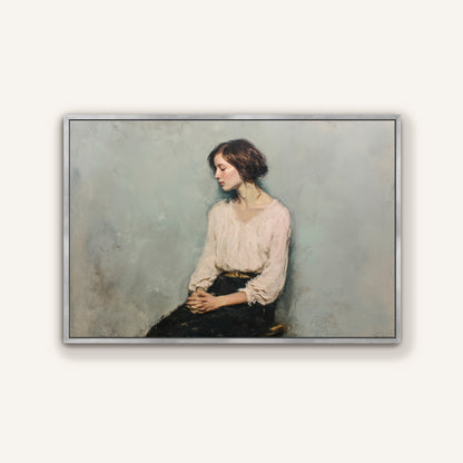 Seated woman portrait framed in brushed silver, timeless art print with muted colors on a light background.