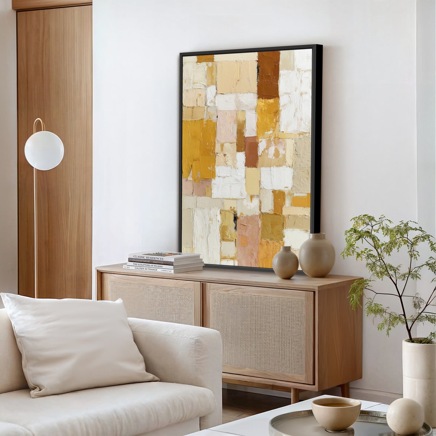 Contemporary abstract wall art with bold geometric brushstrokes in gold, beige, and white.